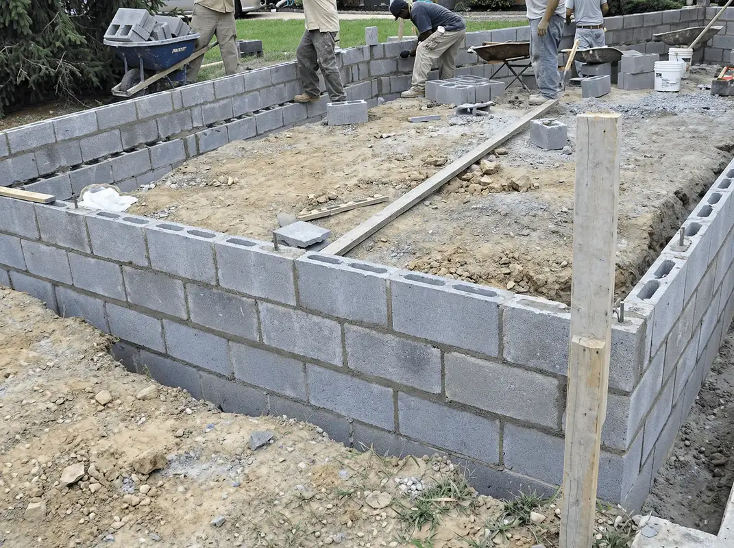 Professionals building a foundation with blocks in Pasadena, CA