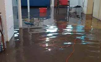 Basement with boiler, cabinets and washing machine completely flooded in Pasadena, CA