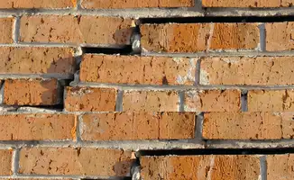 Brick wall with serious structural damage in Pasadena, CA